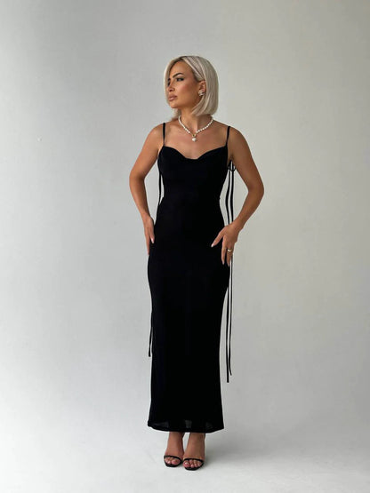 Valentina low back maxi dress with slender straps and ankle-grazing hemline, in black.