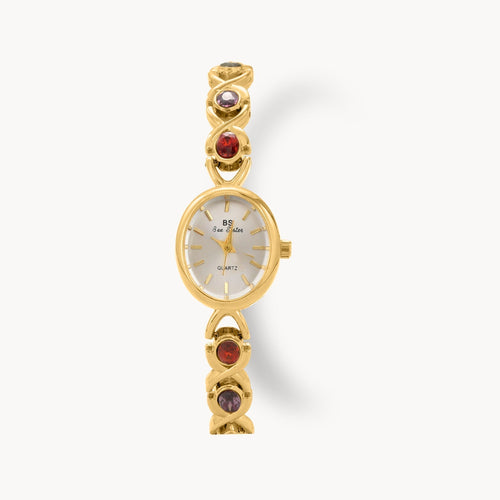 Opal Dynasty Vintage Styled Watch with gold-tone bracelet and gemstone accents.