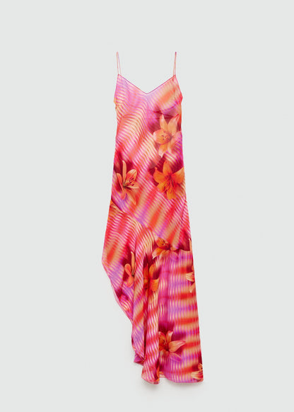 Bryn Asymmetrical Maxi Dress in pink and orange tie-dye print with flowing hemline and backless design.