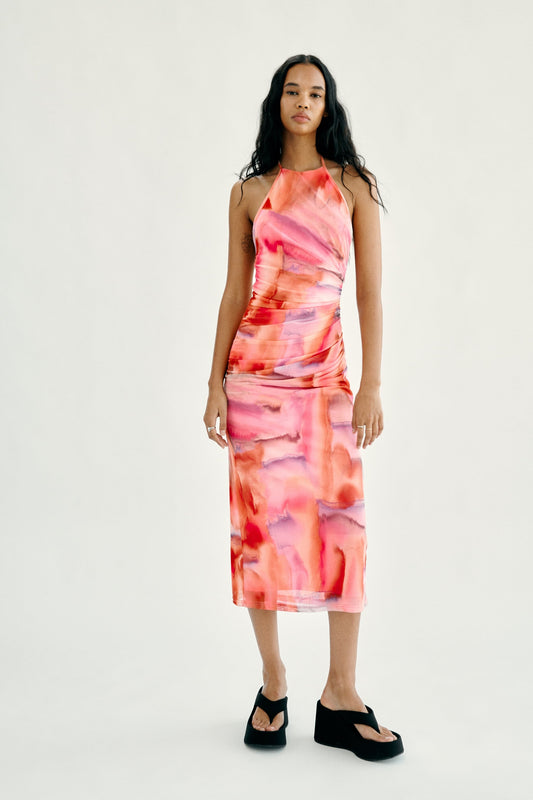 Luz Long Pleated Dress with halter neck and abstract watercolor print.