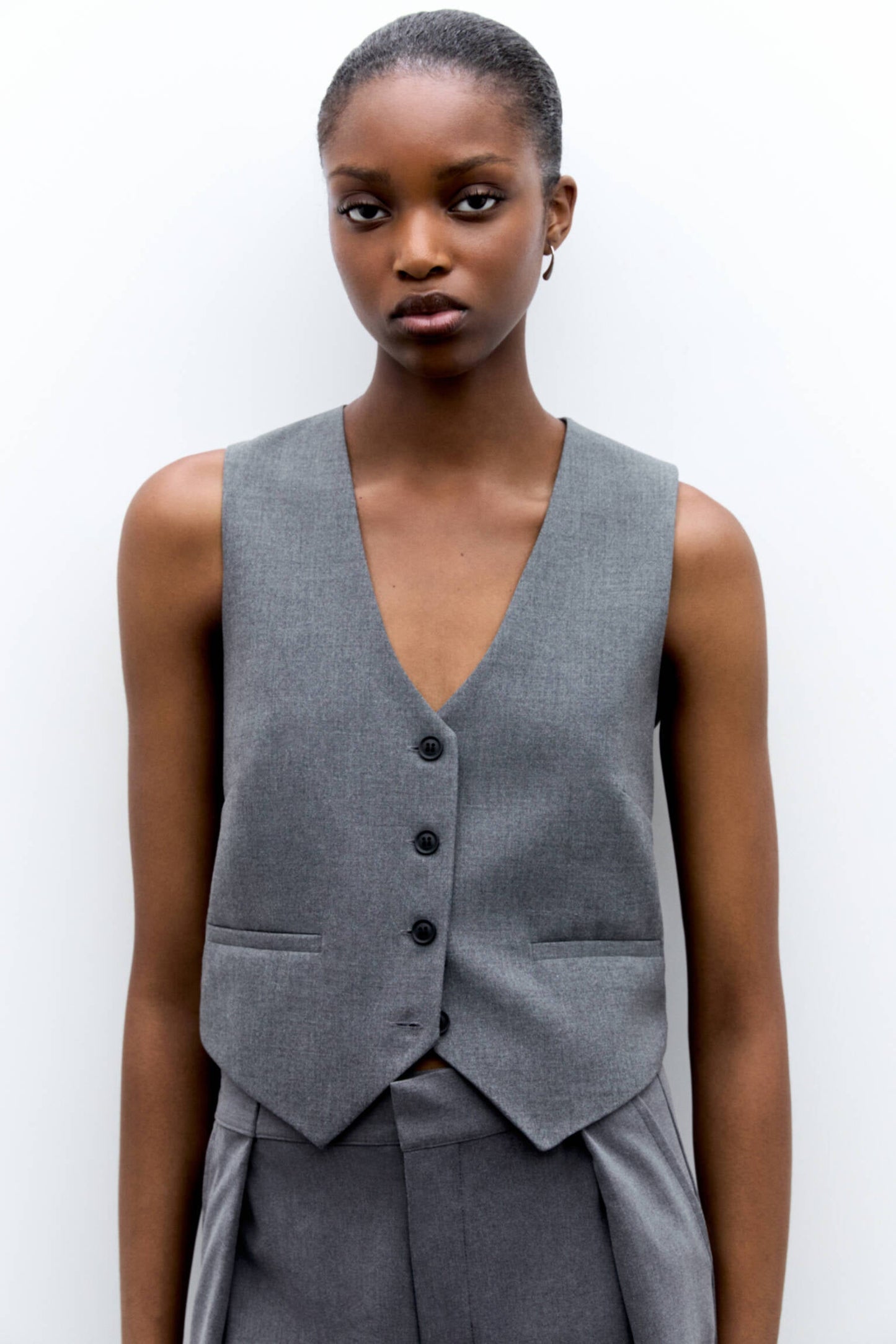 Elegant Diana Halter Vest with sleek silhouette and deep V-neckline.