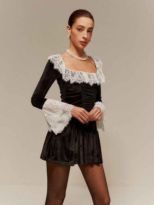 Lydia velvet long sleeve mini dress in black with lace details, elegant and luxurious style.