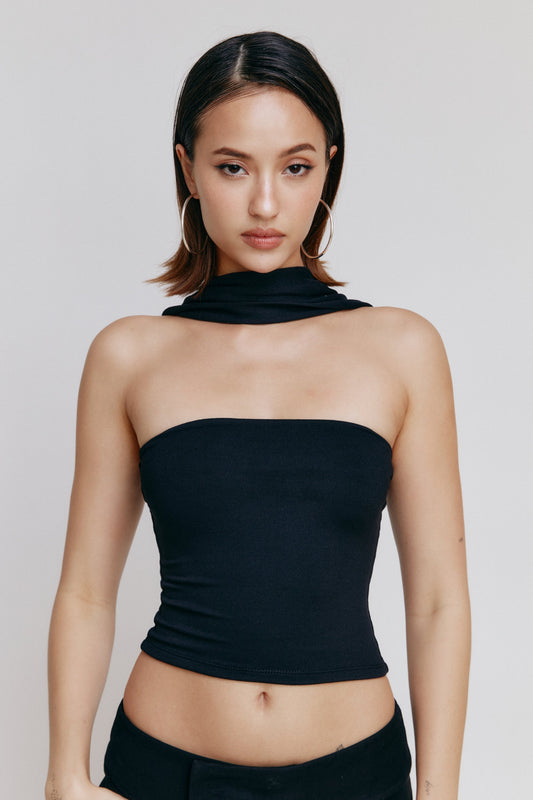 Lily Tube Halter Top in black, showcasing modern tubular design and halter neck for a chic silhouette.