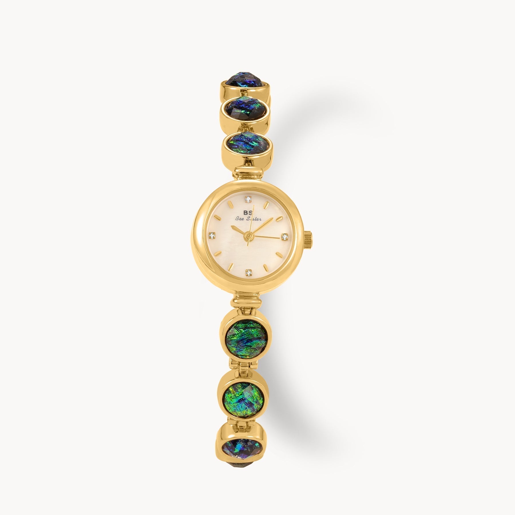 Lunar Mirage Vintage Styled Watch with iridescent accents and stone settings.