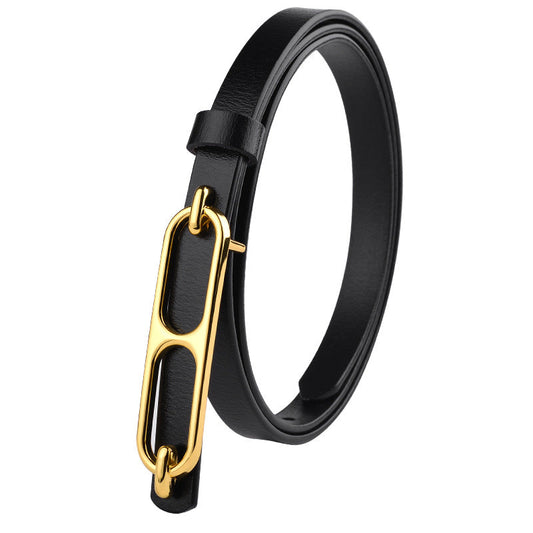 Ladies slim belt in black leather with a polished gold buckle.