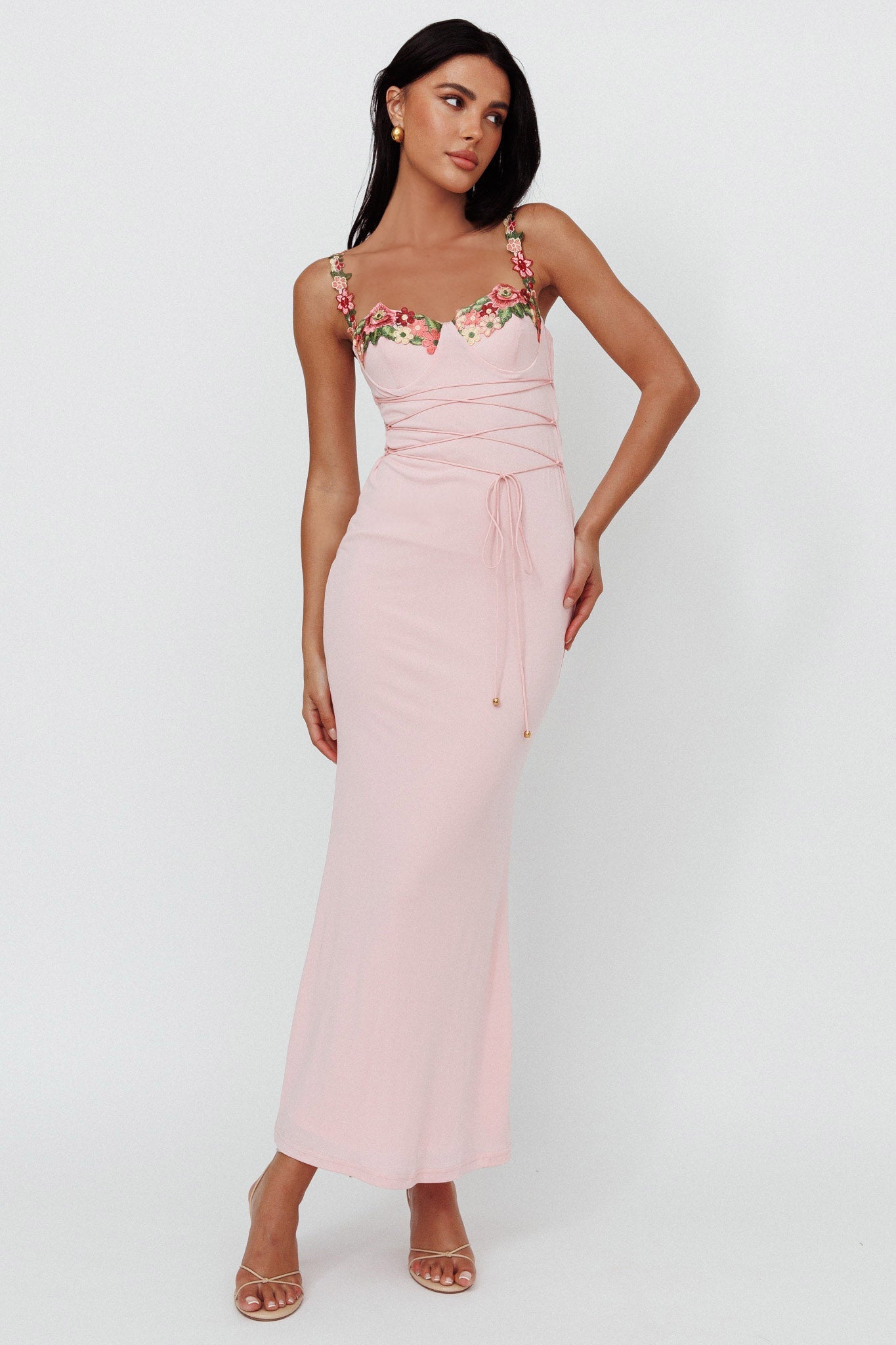 Elegant pink long bodycon dress with floral embroidery and lace-up waist.