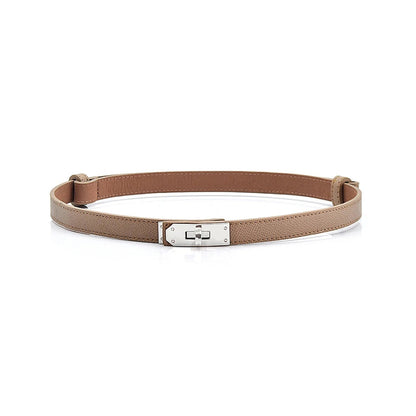 Clarissa skinny leather buckle belt in brown with sleek design and adjustable fit.