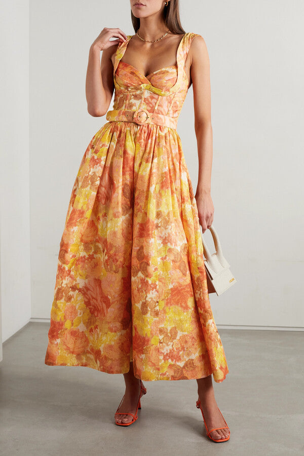 Eloise Orange Floral Dress with sweetheart neckline and vibrant floral pattern.